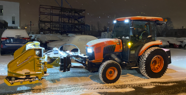 tractor completing snow removal